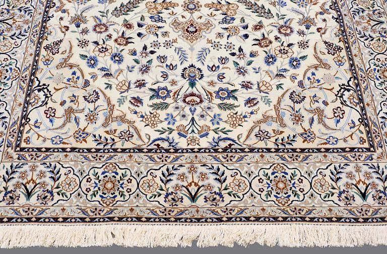 A CARPET, Nain part silk, so called 9 LAA, ca 307 x 210 cm.