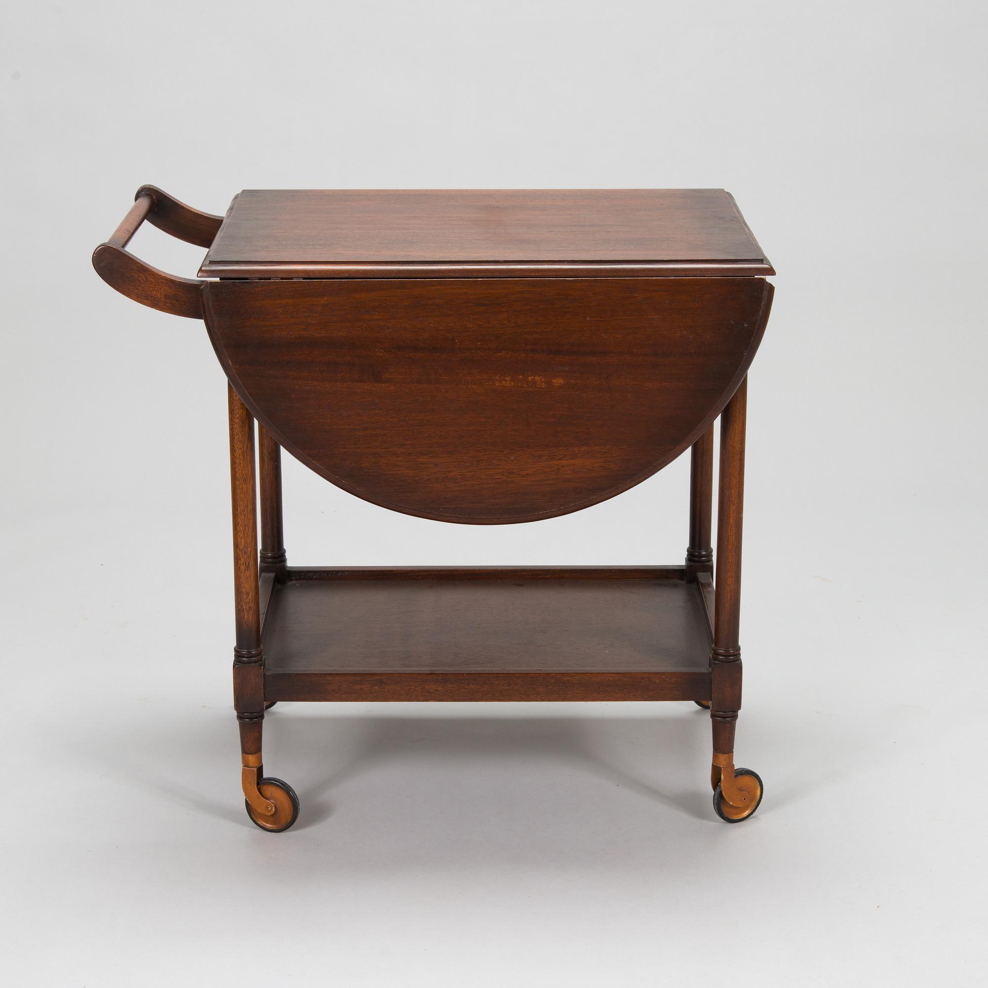 A drop-leaf tea trolley from the latter half of the 20th century.
