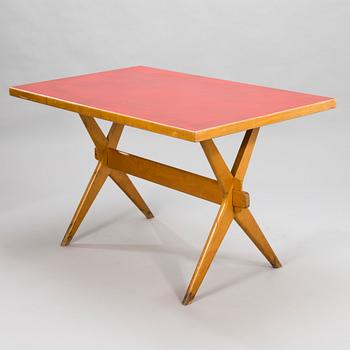 A ILMARI TAPIOVAARA 1940s X-legged table for Keravan Puuteollisuus, Finland.