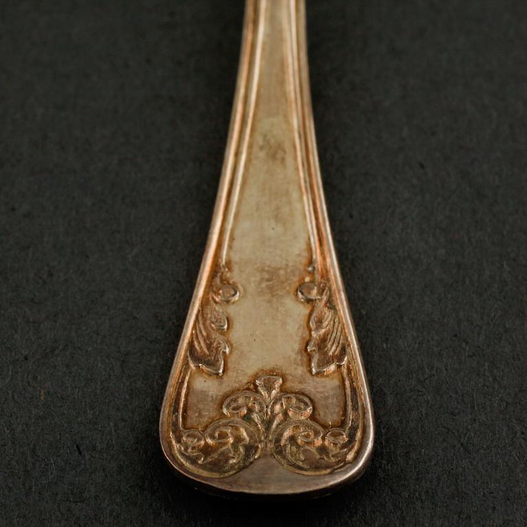 A silver set of table ware, 27 pcs, 19th and 20th century.