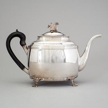 A Swedish 19th century silver tea pot, marked Gustaf Folcker, Stockholm 1820.