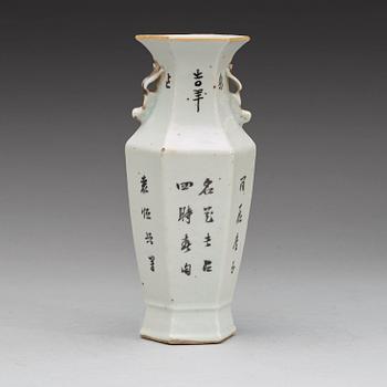 A hexagonal vase enameled with flowers and calligraphy, Republic era (1912-1949).