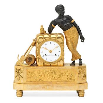 615. An Empire early 19th century mantel clock by Gustaf Undén, master 1800.