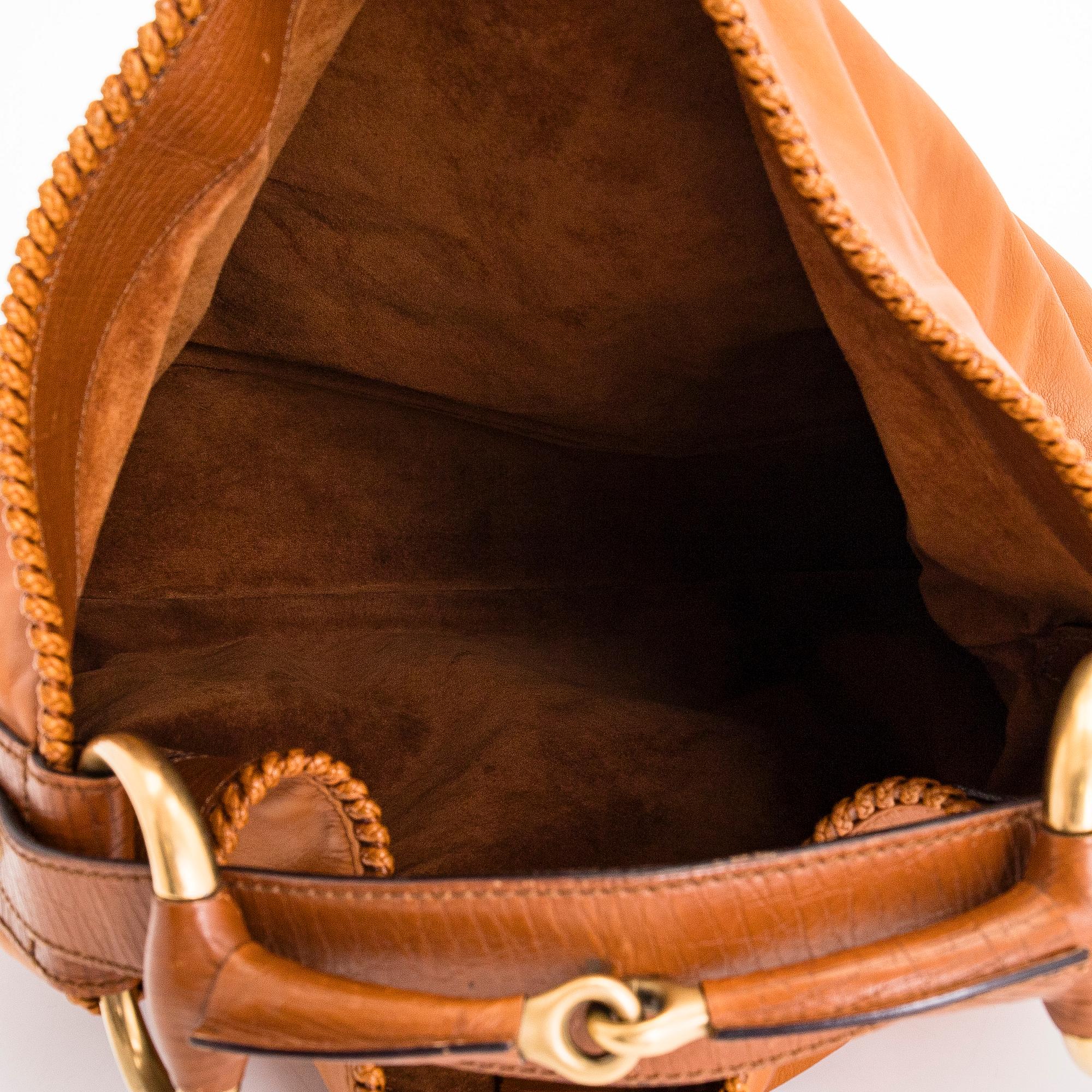 Gucci, a 'Horsebit Hobo' bag.