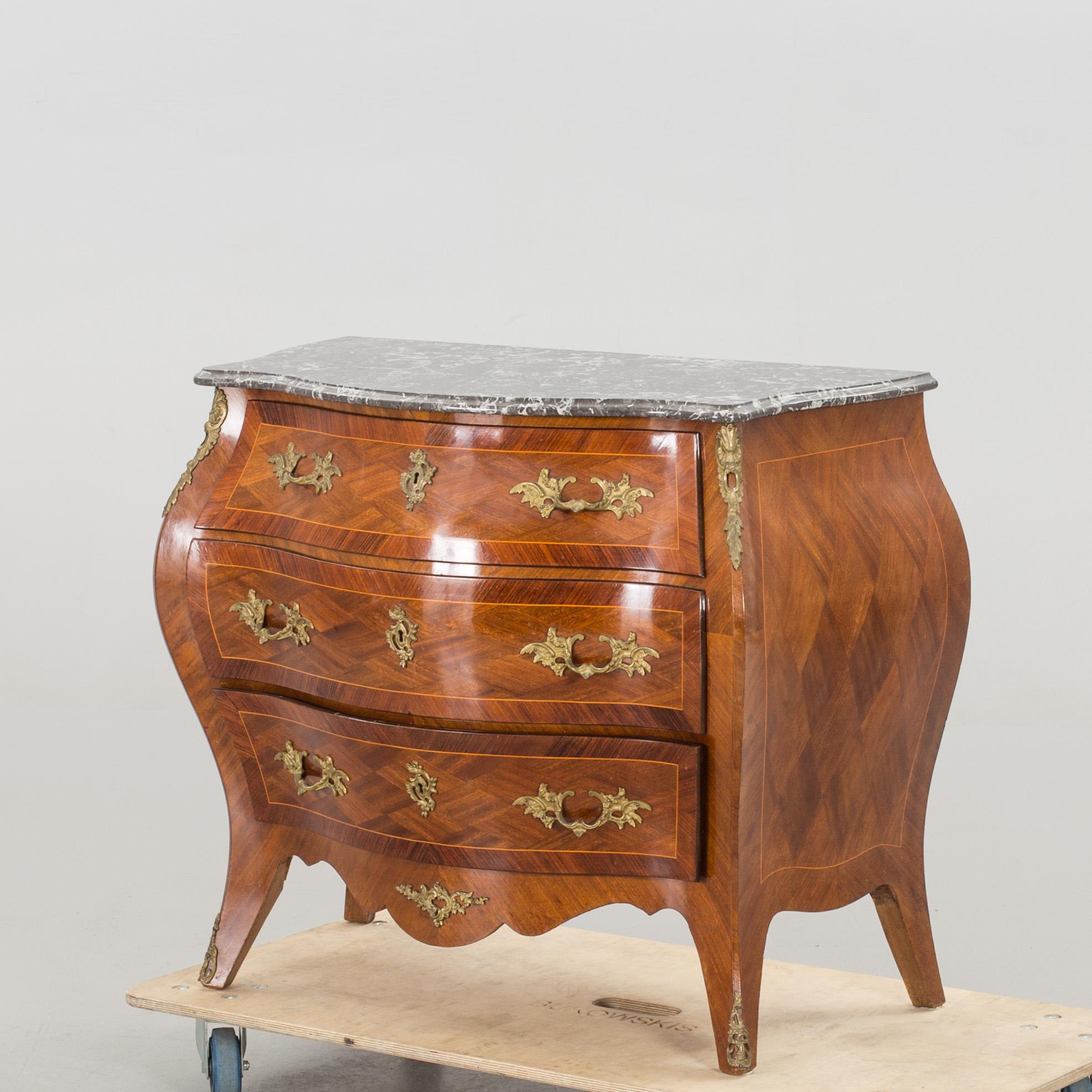 A MID 20TH CENTURY DRAWER ROCOCO STYLE.