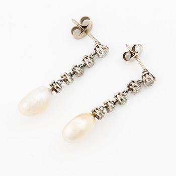 A pair of  earrings in white gold with pearls and old-cut diamonds.