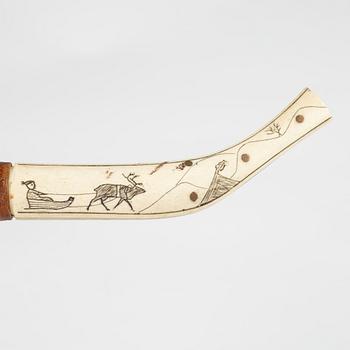 A reindeer horn knife, signed AL.