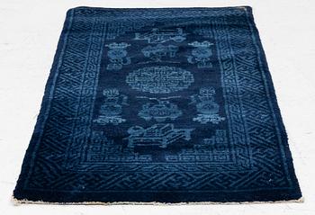 An antique Baotou, rug north China, c. 140 x 70 cm.