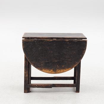 A Swedish wooden table, 19th century.