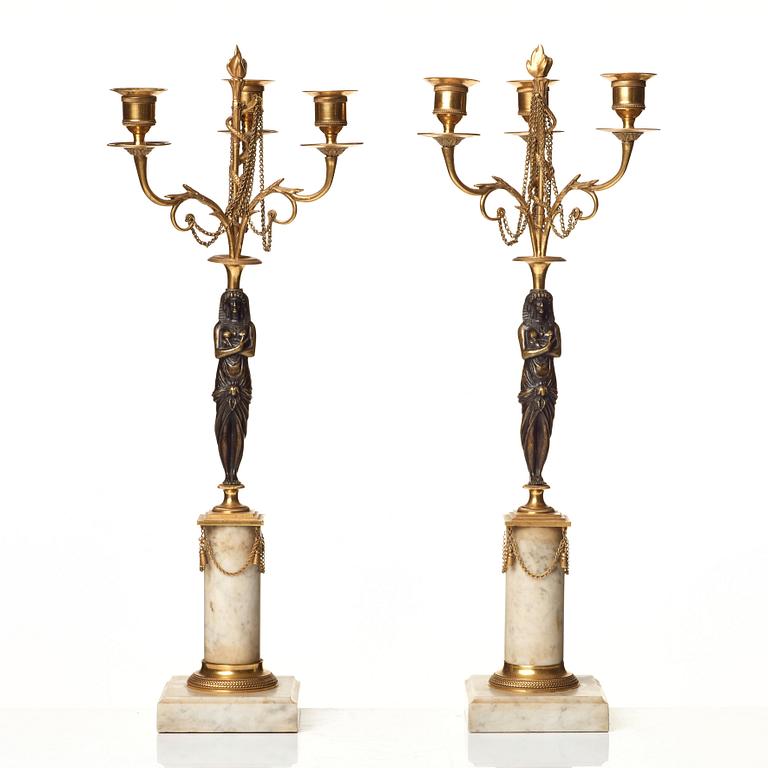 A pair of late Gustavian circa 1800 three-light candelabra.