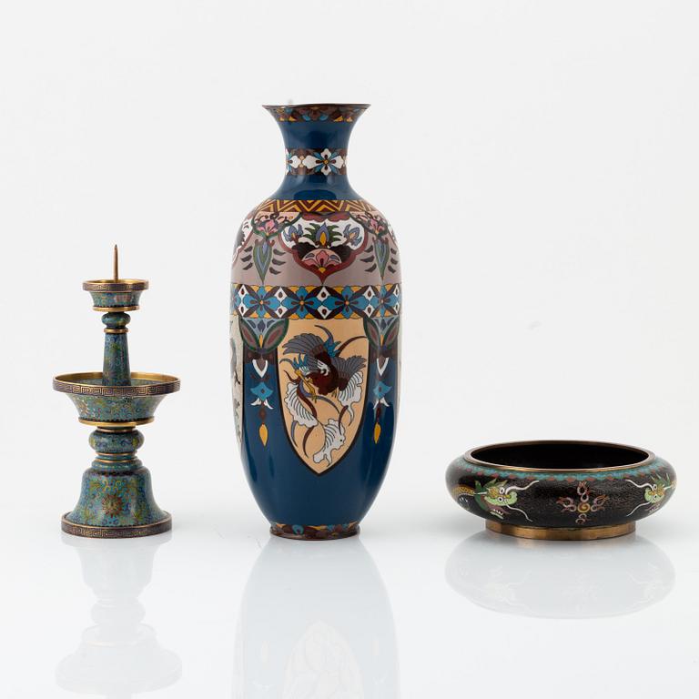 A Chinese cloisonné vase, a bowl and a candlestick, 20th Century.