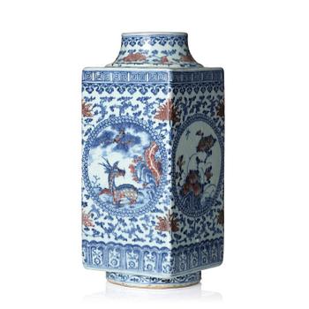 1143. An underglaze blue and copper-red 'crane and deer' cong vase, Qing dynasty, 18/19th century.