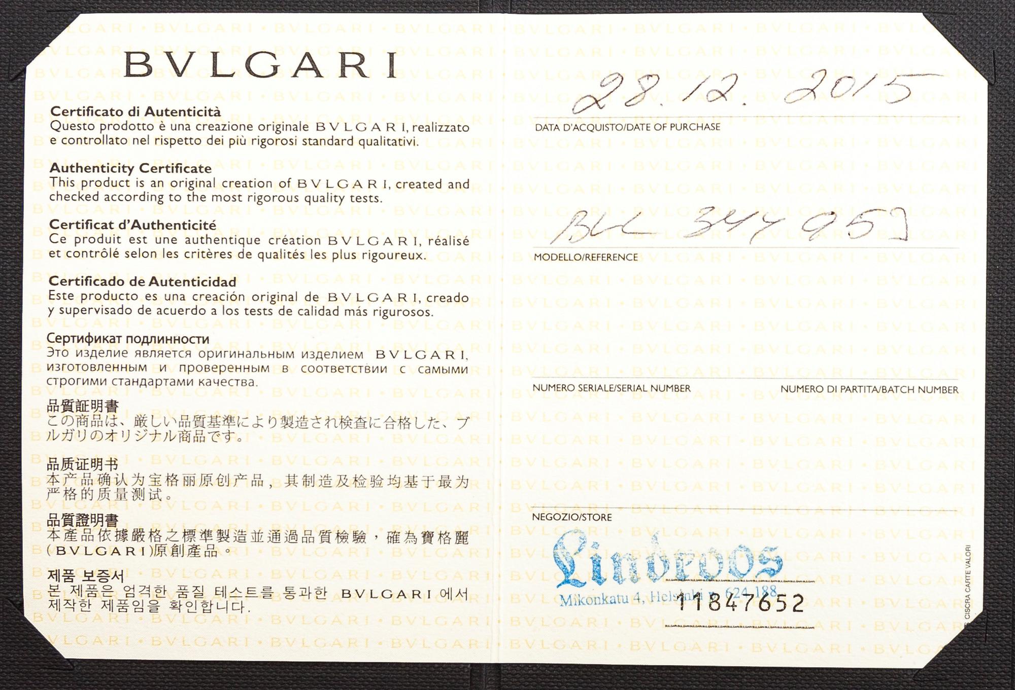 BULGARI, An 18K gold ring "Parentesi" with a green quartz and ca. 0.70 ct of  brilliant cut diamonds in total.