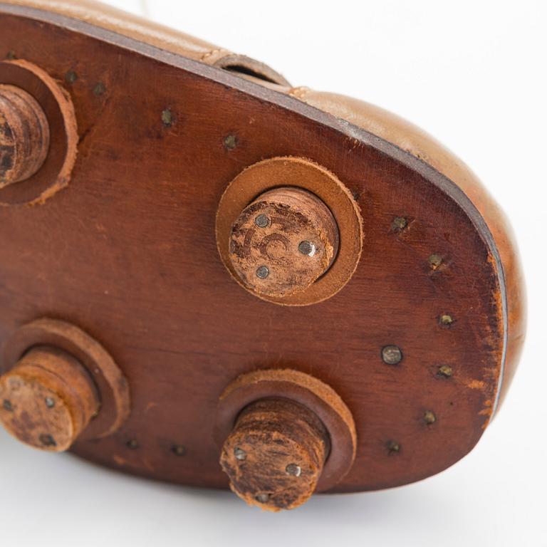 A pair of Olympic football shoes, labelled Karhu. Finland, 1940s.