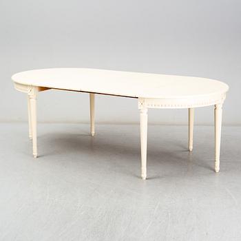 A Gustavian style dining table, second half of the 20th century. 3 leaves included.