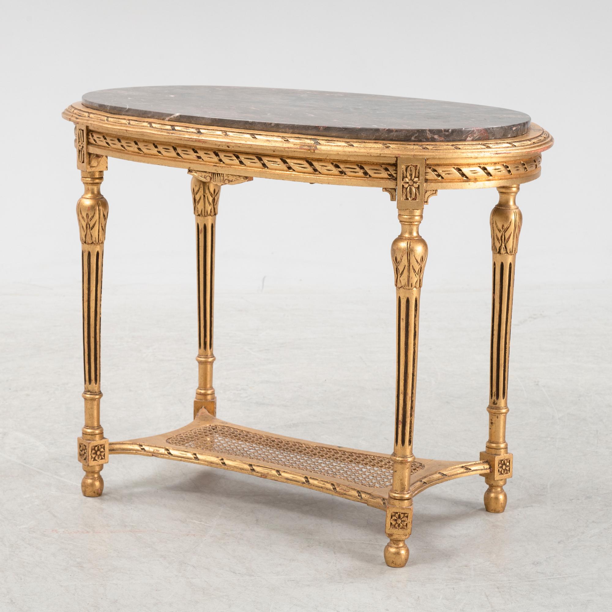 A Louis XVI style table, 20th Century.