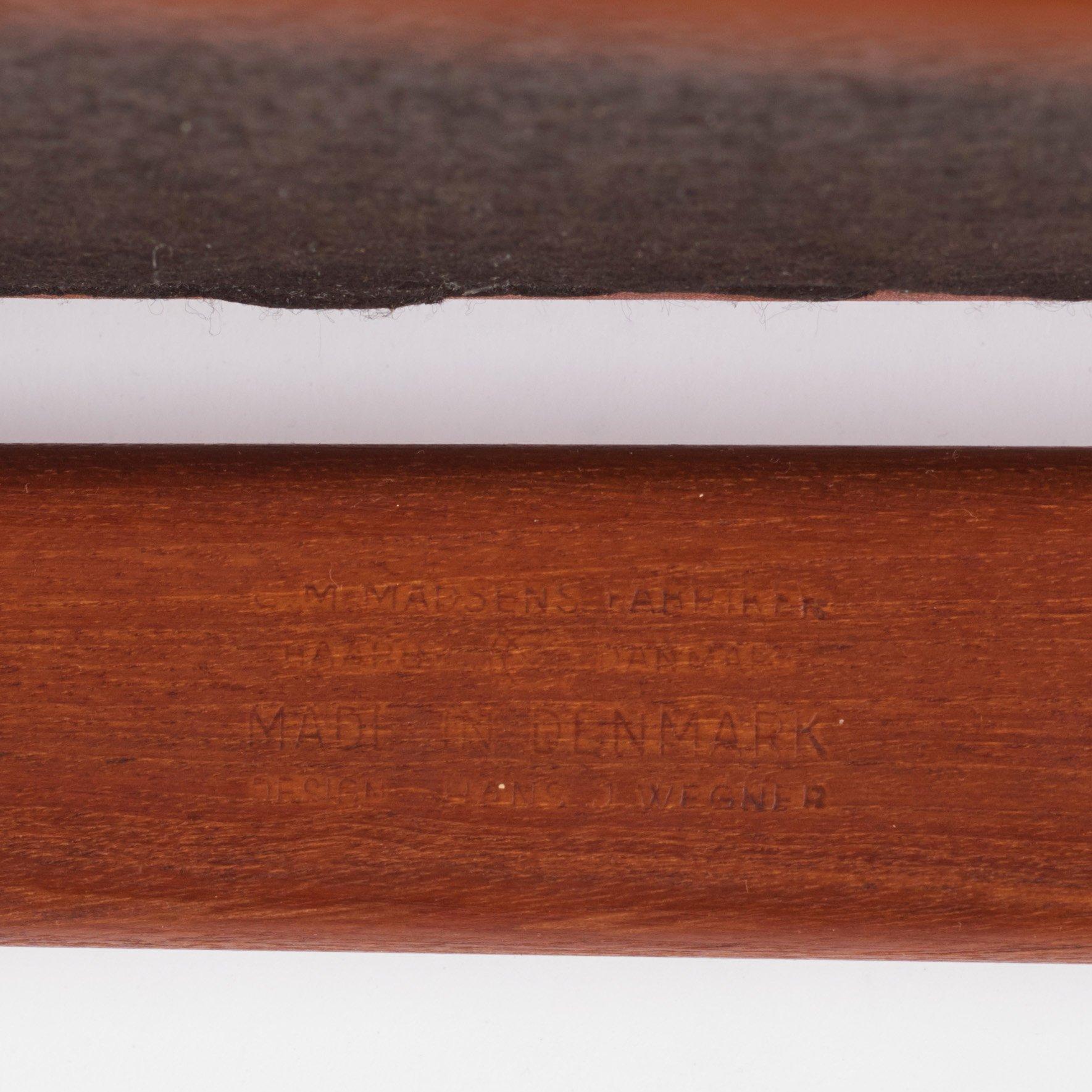 Hans J. Wegner, a set of eight teak chairs model "W2", C.M. Madsens Fabriker, Denmark 1950s.