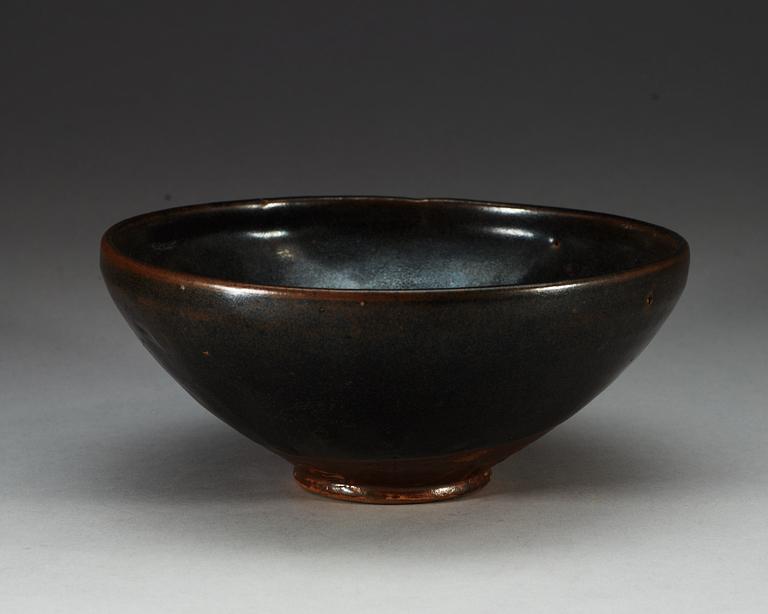 A brown and black glazed bowl, Song dynasty (960-1279).