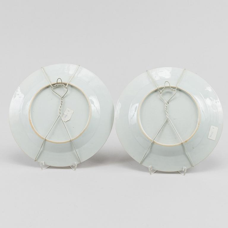 A famille rose dish and two dinner plates, Qing dynasty, Qianlong (1736-95).