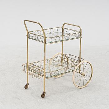 A brass and glass serving trolley, second half of the 20th Century.