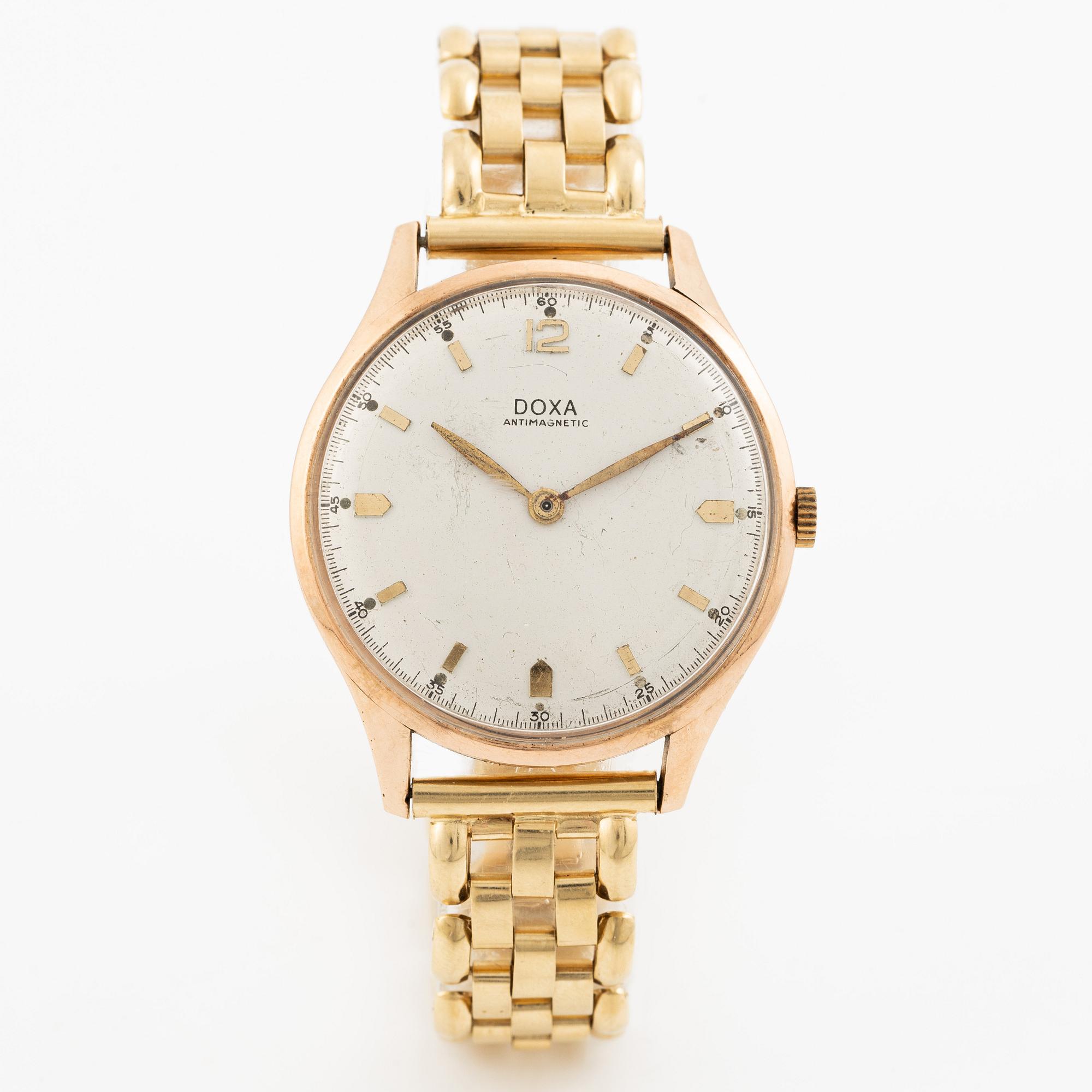Doxa, 14K, wristwatch, bracelet in 18K, 37 mm.