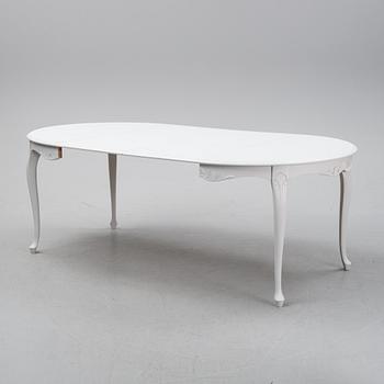 A painted Rococo style dining table, second half of teh 20th century.