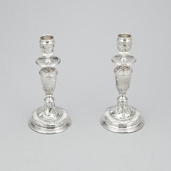 LJUSSTAKAR, ett par, silver, 1900-tal.