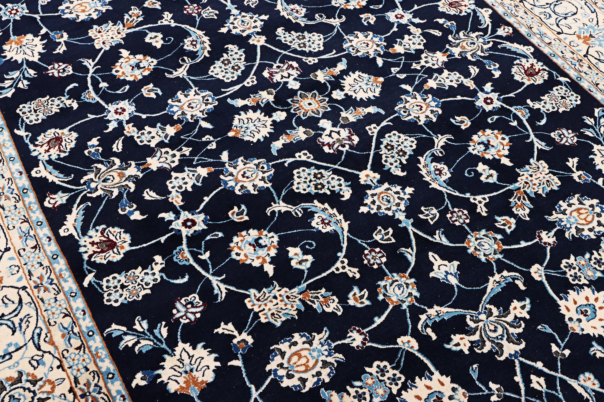 A part silk Nain rug, 9LA, c. 302 x 198 cm.