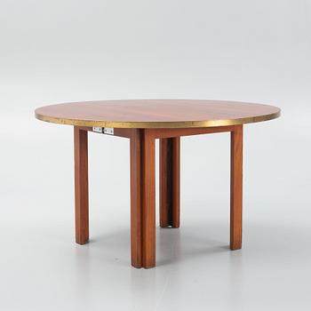A mid 20th century dining table.