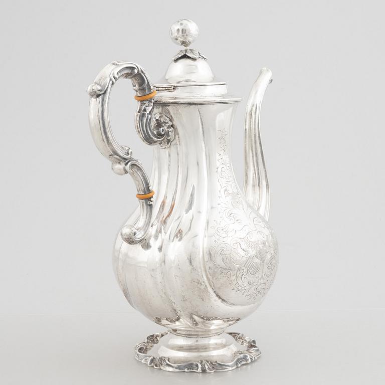 A Swedish Silver Rococo-Revival Coffee Pot, mark of Christian Hammer, Stockholm 1852.