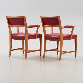 Josef Frank, a pair of mahogany and red leather dining chairs, Svenskt Tenn,