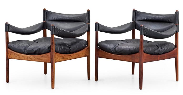 A pair of  Kristian Solmer Vedel palisander and black leather armchair 'Modus' by Søren Willadsen Möblelfabrik, Denmark.