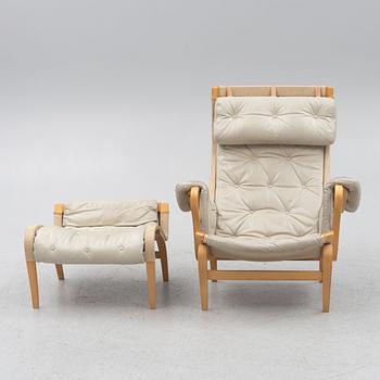 Bruno Mathsson, a 'Pernilla' easy chair witr foot stoll., Dux.