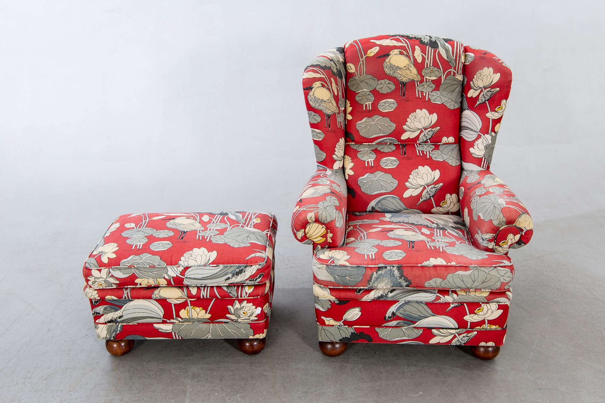 An easy chair with stool later part of the 20th century.