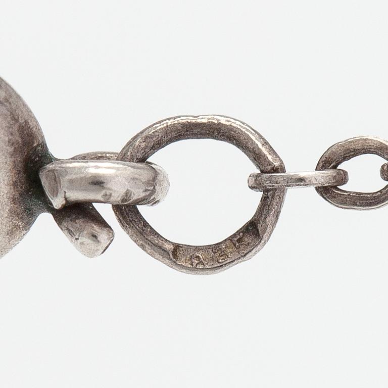 Elis Kauppi, A silver and smoky quartz necklace. Kupittaan kulta, Turku 1961.