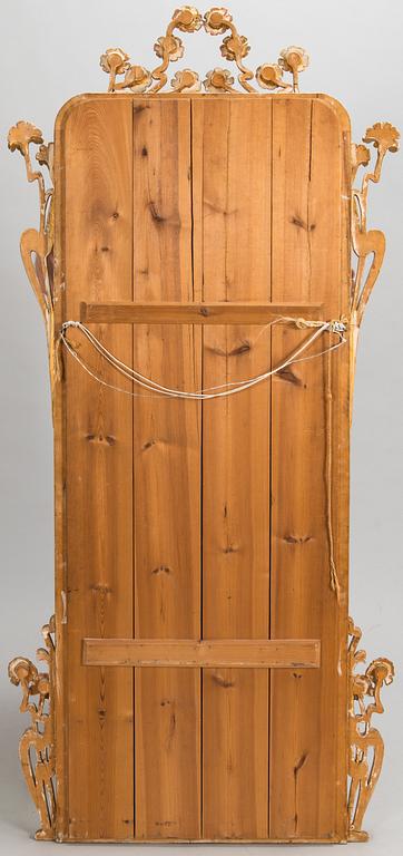 An Art Nouveau mirror with console table from early 20th century.