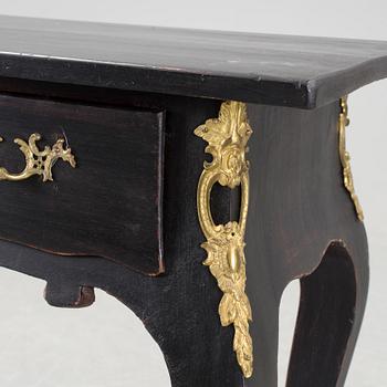 A table in the rococo style, first half of 20th century.