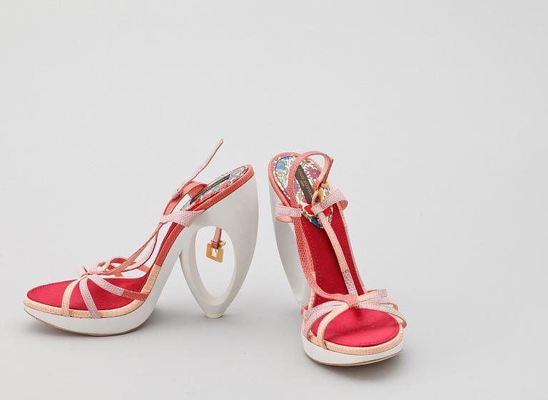 A pair of high-heeled sandals by Louis Vuitton.