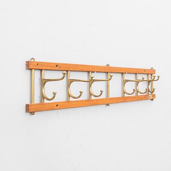 Clothes hangers, three "Decorative" Skoglund's Metal Foundry Anderstorp 1950s/60s.