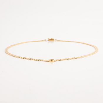 Necklace 18K gold with a round brilliant-cut diamond.