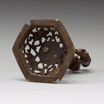 A bronze cover, presumably Qing dynasty.