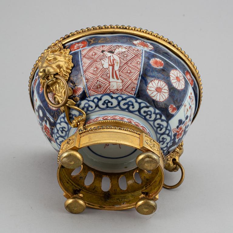 A Japanese imari bowl, with  European bronze mount, 19th century.