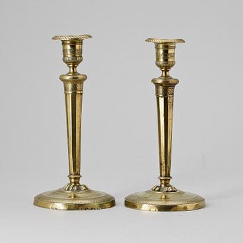LJUSSTAKAR, ett par, mässing, empire, 1800-talets första hälft.