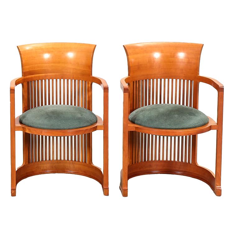 Frank Lloyd Wright, a pair of Barrel chairs model no 606 for Cassina numbered and dated 1986.