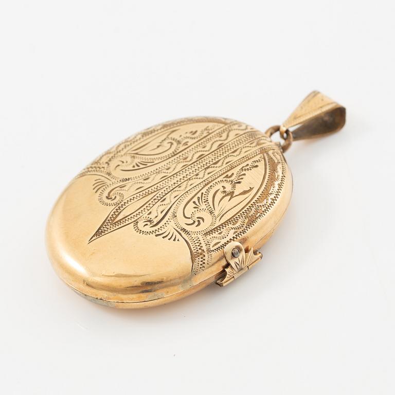 Medaljong 14K guld.