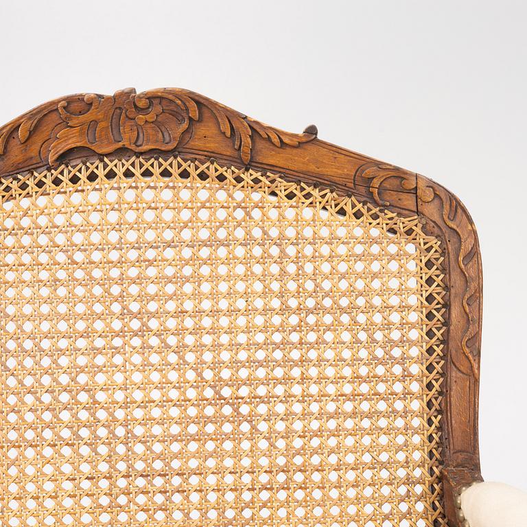 A French Louis XV armchair, mid 18th century.