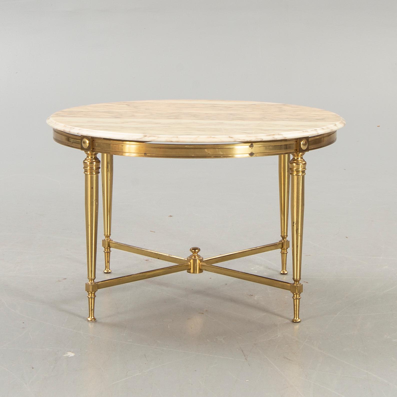 A mid 1900s/second half marble coffee table.