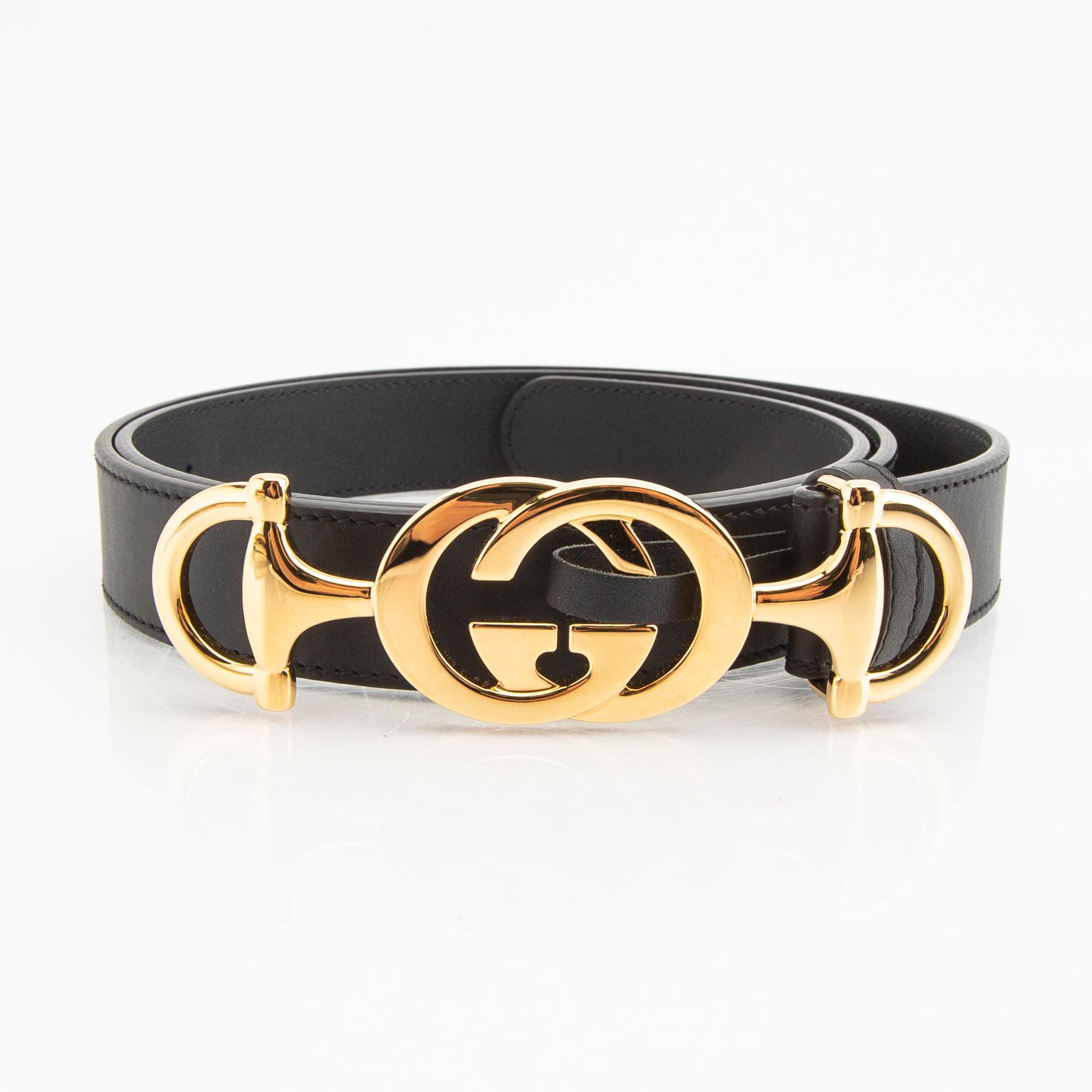 Gucci, belt and shawl.