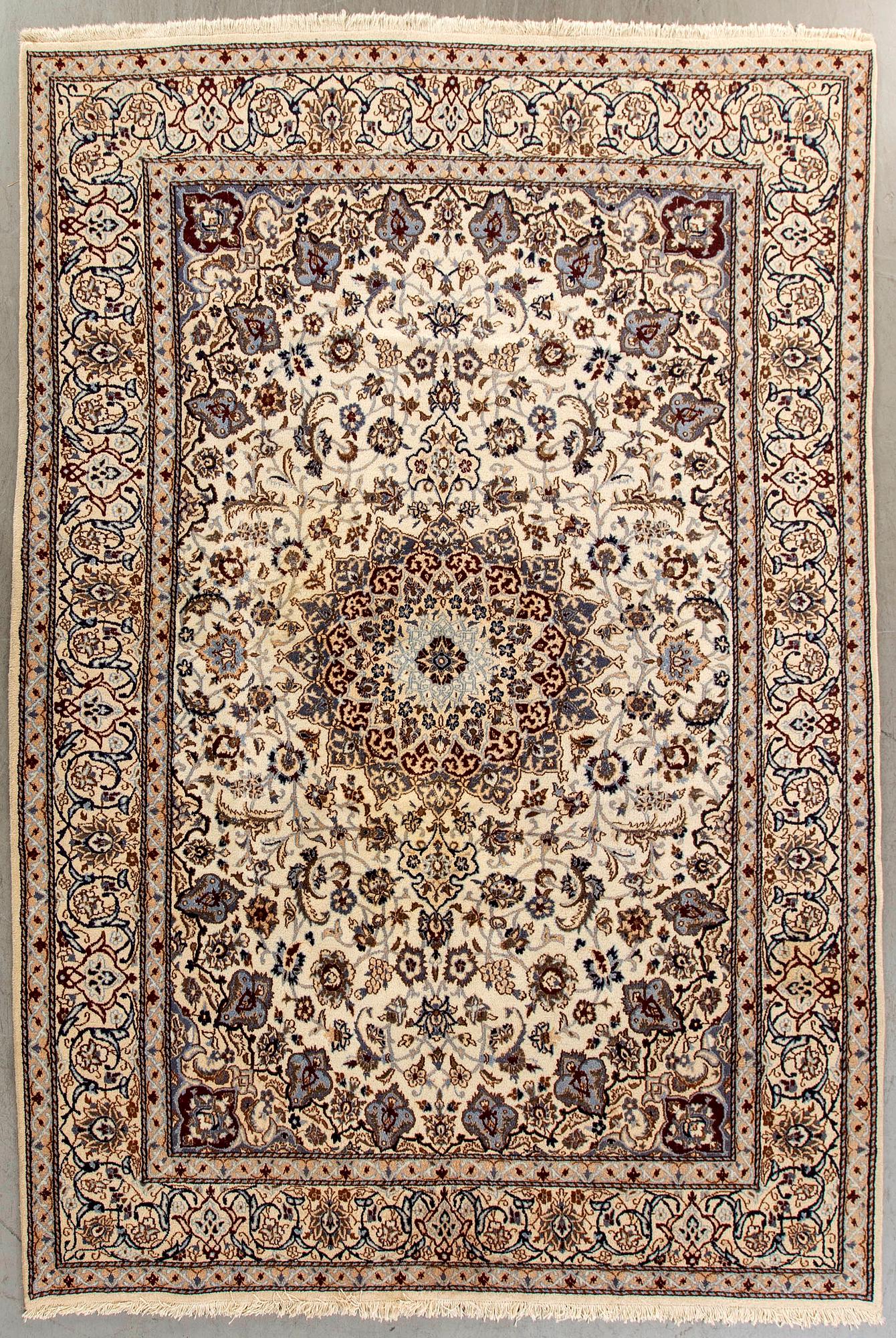 An old Kerman carpet ca 349 x 242 cm.