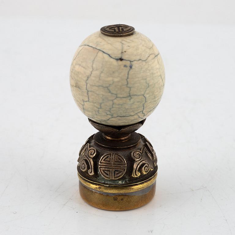 A Chinese hat finial / mandarin insignia, late Qing dynasty, 19th century.